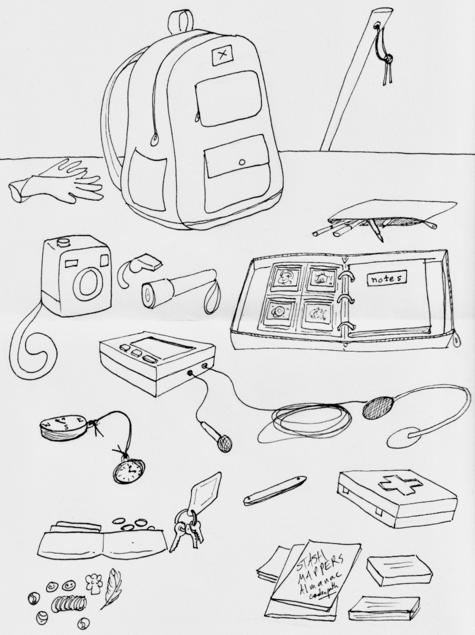 An array of items spread out on a table: a pair of gloves, a backpack, a walking stick standing behind the table, a pencil bag full of pens and pencils, an instant camera, an emergency whistle, a small flashlight, a zip-sided beinder containing a plastic sleeve page full of instant photos and a notebook, a portable cassette tape player with a small microphone and a pair of headphones attached, a compass tied to a pocket watch, a wallet with some cards and coins spilling out, a set of keys on a ring, a closed pocket knife, a first-aid kit, some cassette cases, a small stack of zines -- the top one's cover says Stash Mappers Almanac Gardenpath -- and a small collection of random objects including marbles, and a tiny feather.